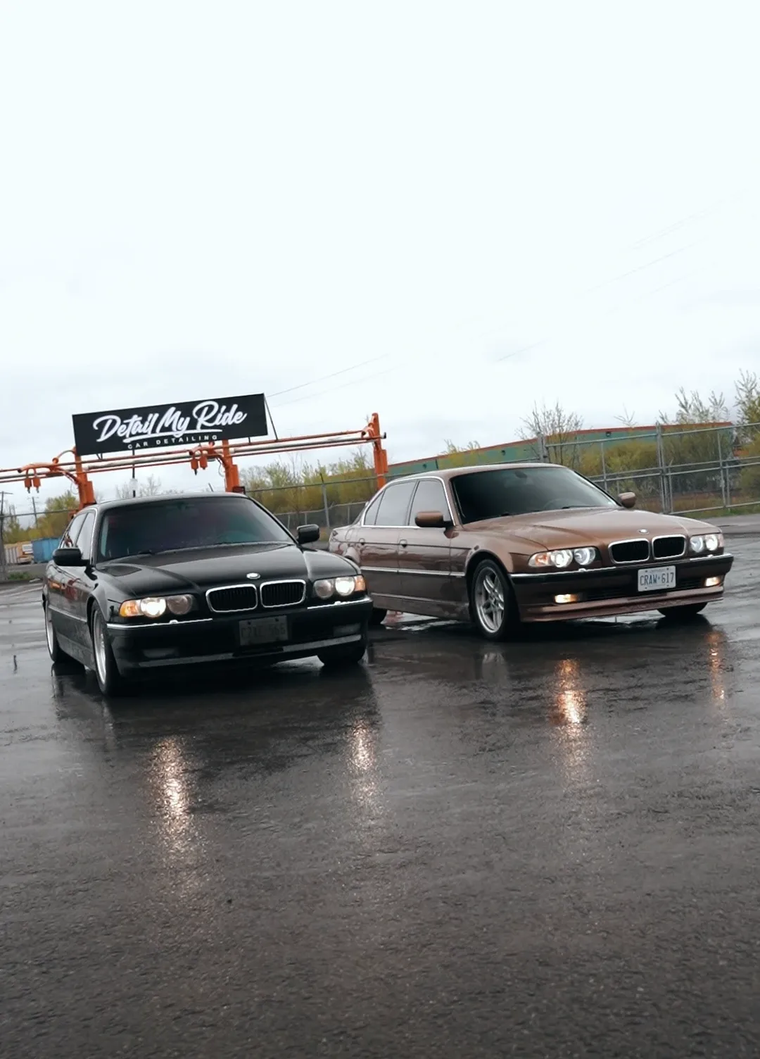 Two BMW E38s parked outside the Tint My Ride shopfront on Hawthorne Rd